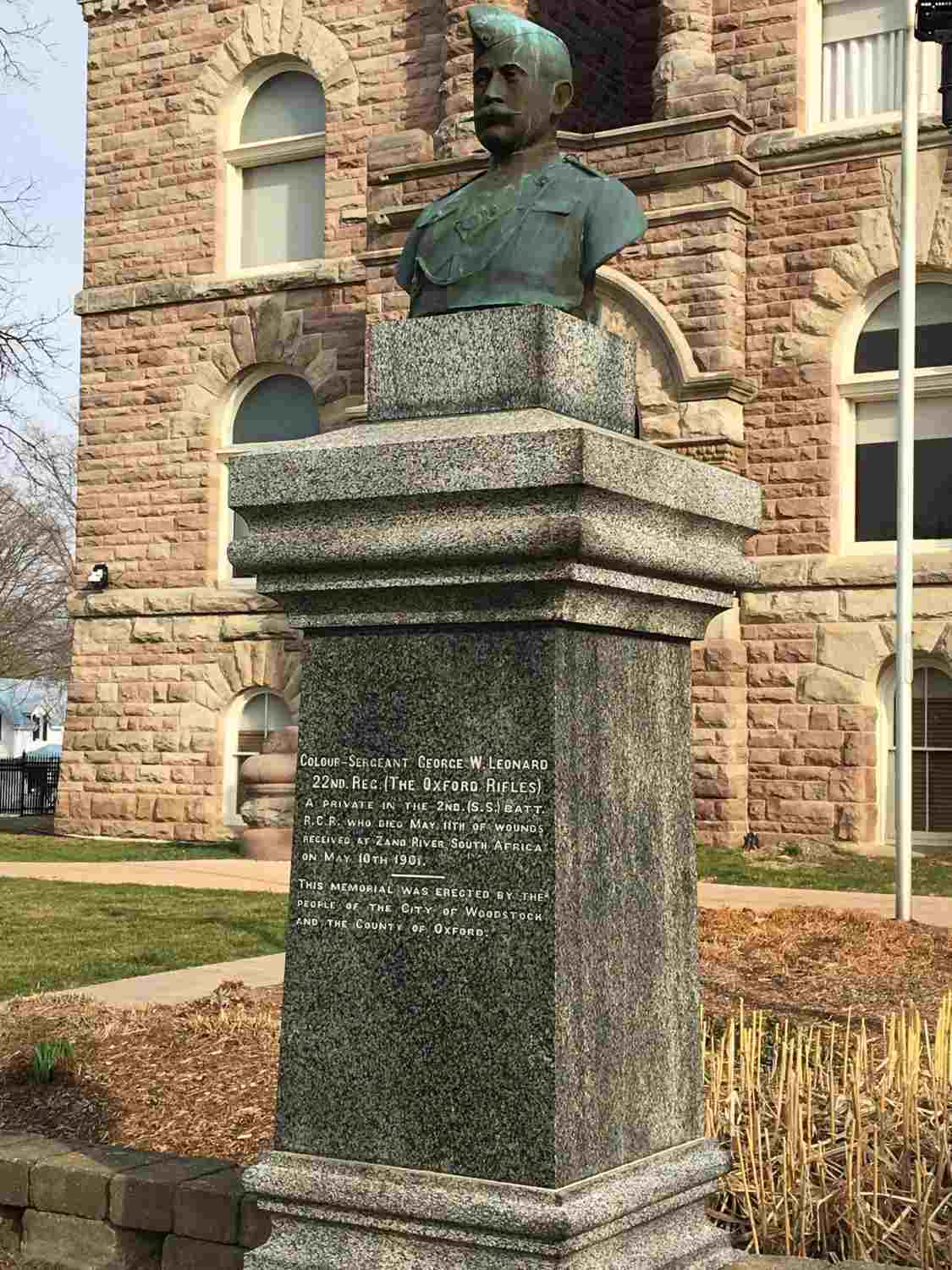 A memorial in the County Courthouse Square in Woodstock, Ontario honouring Colour-Sergeant George W. Leonard and Corporal Myrtle Davidson who lost their lives during the Boer War. The memorial features a bust of Colour-Sergeant George W. Leonard.