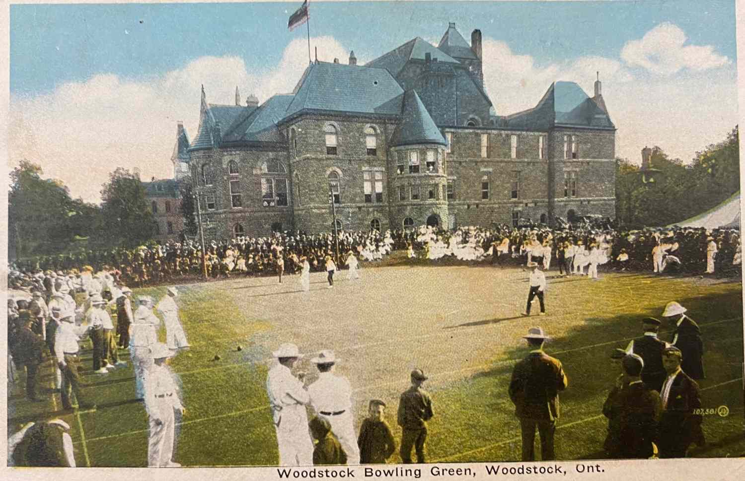 A group gathered for a lawn bowling game on the bowling greens behind the Oxford County Courthouse in Woodstock, Ontario.