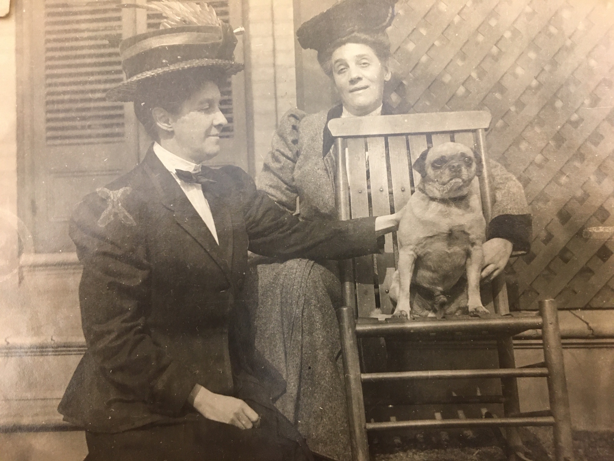 Two women and a pug